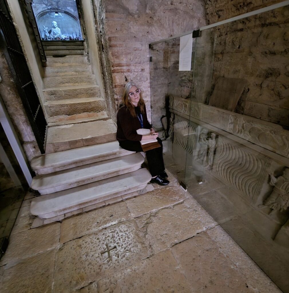 On location in Marseille, France, writing in the tomb of Mary Magdalene.